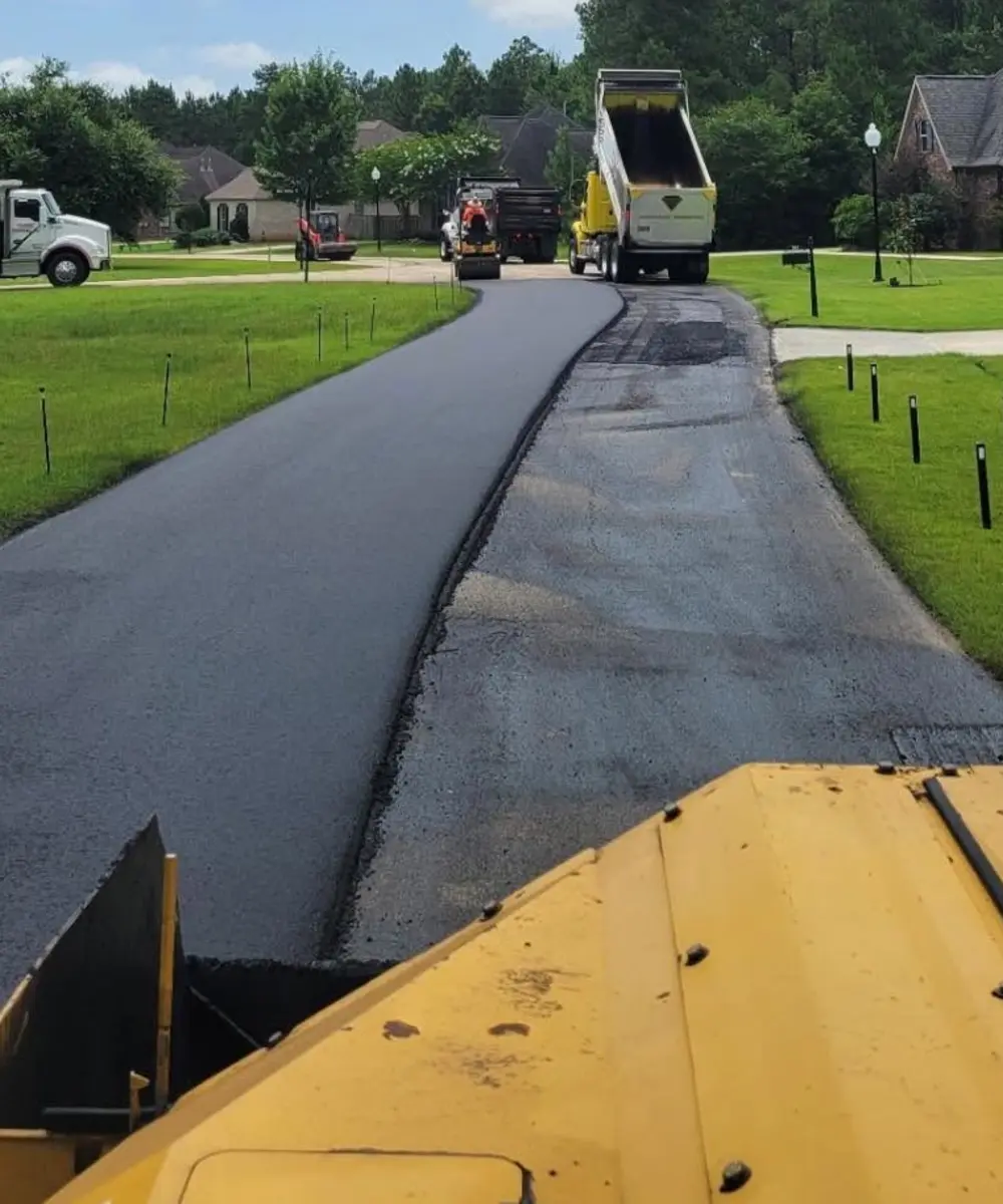 Chris Paving MS crew and equipment working on an asphalt paving project